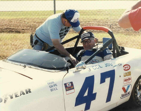 Joe on Pole, Road Atlanta - Bob Ward strapping in. 