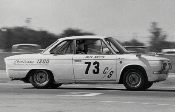 Pete Brock's Hino 1300 on the way to victory
