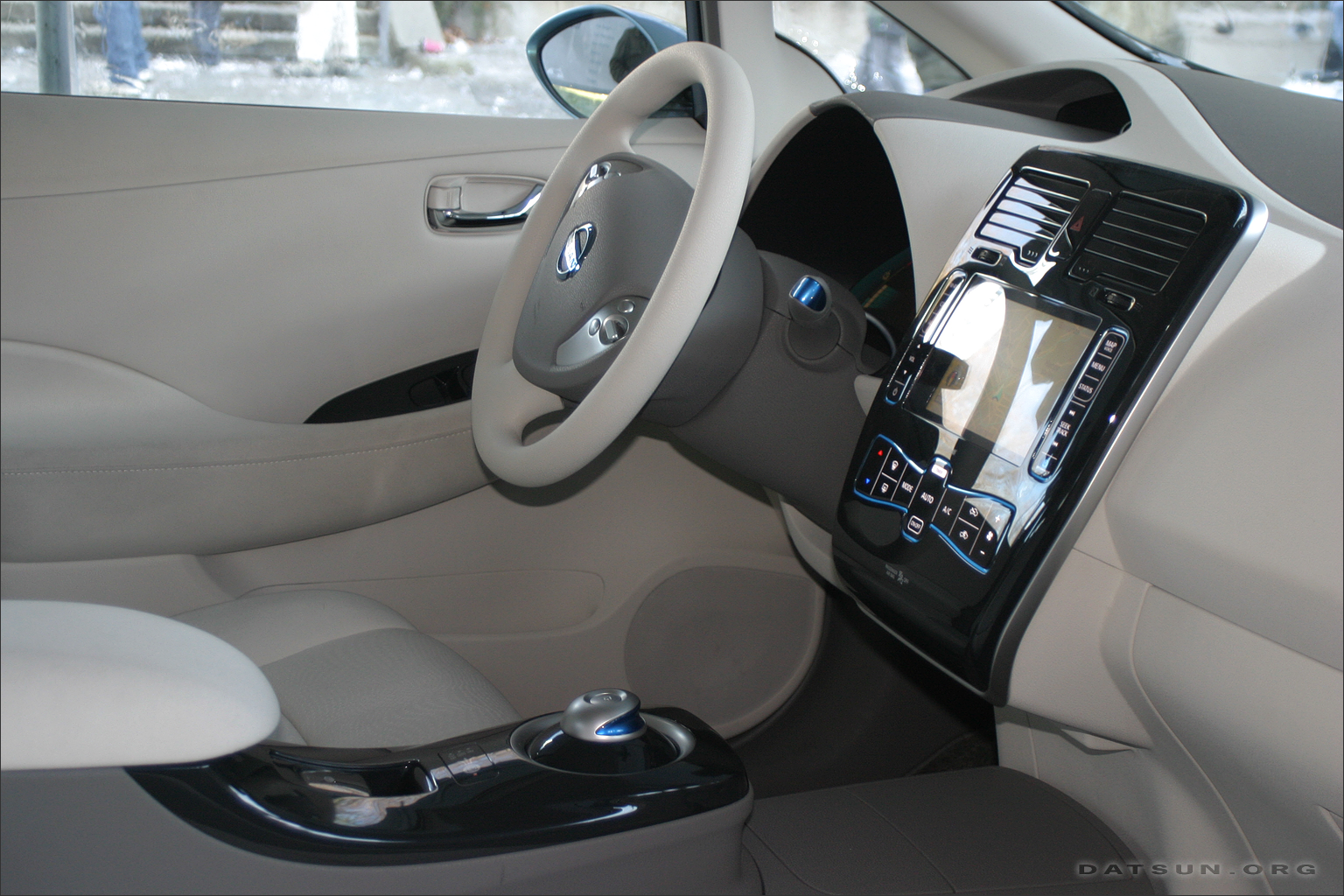 Interior seems roomy and car-like with central command consoles